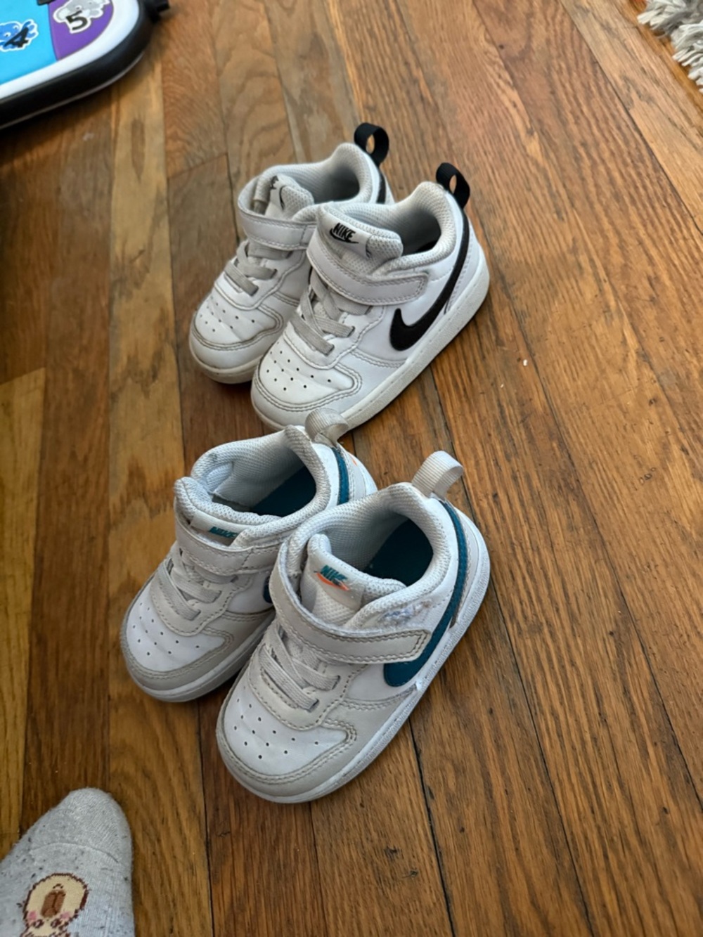 Nike Kids White Sneakers with Black and Teal Accents